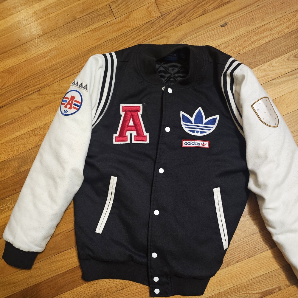 Adidas Black and Cream Varsity Jacket.